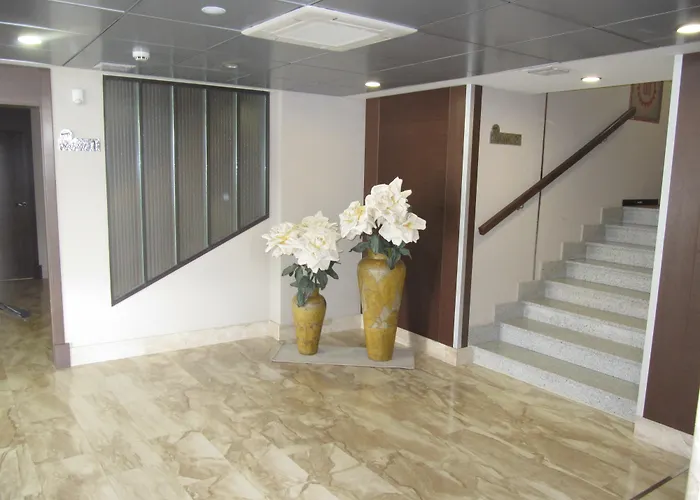 Отель Sercotel Cuatro Postes