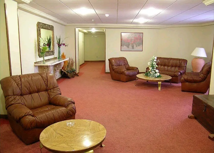 Отель Sercotel Cuatro Postes